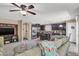 Open-concept living space combining the kitchen, dining area, and living room at 10230 Danskin Dr, Las Vegas, NV 89166