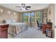 Bright main bedroom with three large windows bringing in natural light at 10230 Danskin Dr, Las Vegas, NV 89166