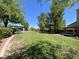 A well-maintained community park featuring green spaces, benches, walking paths, and a gazebo at 10230 Danskin Dr, Las Vegas, NV 89166