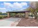 Covered picnic area with tables and a grill, ideal for outdoor gatherings and Gathering fun at 10540 Beachwalk Pl, Las Vegas, NV 89144