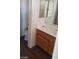 Bathroom with vanity, wooden cabinets, and neutral walls providing a practical space at 1236 Dusty Creek St, Las Vegas, NV 89128