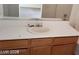 Bathroom vanity with a white countertop and a large mirror offering lots of counter space at 1236 Dusty Creek St, Las Vegas, NV 89128