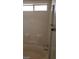 Bathroom features a tub with tiled walls, providing a clean and functional space for relaxation at 1236 Dusty Creek St, Las Vegas, NV 89128