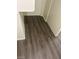 This closet features a neutral color palette and modern vinyl plank flooring at 1236 Dusty Creek St, Las Vegas, NV 89128
