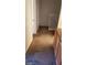 Hallway with cabinets and access to an upstairs space at 1236 Dusty Creek St, Las Vegas, NV 89128