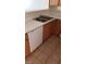 Bright kitchen featuring a white dishwasher and stainless steel sink at 1236 Dusty Creek St, Las Vegas, NV 89128