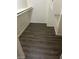 This walk-in closet features built in shelving and updated flooring at 1236 Dusty Creek St, Las Vegas, NV 89128