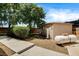 Backyard featuring an outdoor shed and propane tank at 12780 Davis Wright Ct, Henderson, NV 89044