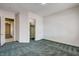 Bedroom features plush carpet and access to walk-in closet and hallway at 12780 Davis Wright Ct, Henderson, NV 89044