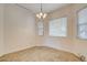 Bright dining area with tile floors and windows providing ample natural light at 12780 Davis Wright Ct, Henderson, NV 89044
