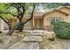 Lovely single-story home with stone accents, a well-maintained front yard, and inviting walkway at 12780 Davis Wright Ct, Henderson, NV 89044