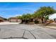 Inviting single-story home with well-manicured front yard and a three-car garage on a sunny day at 12780 Davis Wright Ct, Henderson, NV 89044