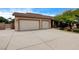 Spacious three-car garage and extended driveway offer plenty of parking at 12780 Davis Wright Ct, Henderson, NV 89044
