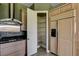 Kitchen featuring stainless steel appliances and custom cabinets with walk-in pantry at 12780 Davis Wright Ct, Henderson, NV 89044