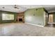 Spacious living room features a stone fireplace, and vaulted ceiling with recessed lights at 12780 Davis Wright Ct, Henderson, NV 89044