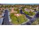 An aerial view shows the neighborhood, with tree lined streets, parking and nearby businesses at 1316 Capri Dr # Abc&D, Boulder City, NV 89005