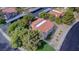 Overhead view of the condos showing roof lines, parking, mature trees, and landscaping at 1316 Capri Dr # Abc&D, Boulder City, NV 89005