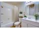 Bright bathroom with a shower-tub combo, modern vanity, and elegant fixtures, perfect for a refreshing experience at 1316 Capri Dr # Abc&D, Boulder City, NV 89005