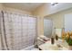 Neat bathroom features a shower-tub combo, vanity, and soothing colors, providing a clean and calming space at 1316 Capri Dr # Abc&D, Boulder City, NV 89005