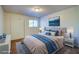 Inviting bedroom featuring cozy carpeting, a closet with sliding doors, and plenty of natural light at 1316 Capri Dr # Abc&D, Boulder City, NV 89005