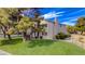 Inviting apartment complex with lush lawn and mature trees offering ground level and upper level units at 1316 Capri Dr # Abc&D, Boulder City, NV 89005
