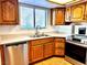 Well-lit kitchen featuring updated countertops, cabinets and appliances for modern living at 1316 Capri Dr # Abc&D, Boulder City, NV 89005