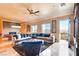 Comfortable living room with stylish decor, plush seating, and a view of the balcony at 15 Via Mantova # 401, Henderson, NV 89011