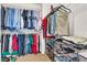 Organized walk-in closet with shelving and ample storage space for clothes and shoes at 1825 Derbyshire Dr, Las Vegas, NV 89117