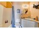 Cozy bathroom with a shower-tub combo, toilet, and single sink vanity offers a functional space at 2454 Paradise Village Way, Las Vegas, NV 89120