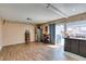 Bright kitchen area features wood-look flooring and stainless steel appliances at 2454 Paradise Village Way, Las Vegas, NV 89120