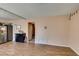 Bright, open living area featuring wood-look flooring and neutral walls at 2454 Paradise Village Way, Las Vegas, NV 89120