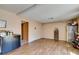 Spacious living area with wood-look flooring and neutral wall color at 2454 Paradise Village Way, Las Vegas, NV 89120