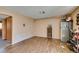 Open living area featuring wood-look flooring and neutral paint at 2454 Paradise Village Way, Las Vegas, NV 89120