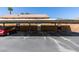 Well-maintained carport with numbered parking spots for residents at 2454 Paradise Village Way, Las Vegas, NV 89120