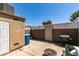 Private outdoor patio space with barbecue, fire pit, perfect for entertaining or relaxing outdoors at 2454 Paradise Village Way, Las Vegas, NV 89120