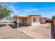 Backyard patio features white metal cover, and brick-paved patio at 2559 Winterwood Blvd, Las Vegas, NV 89142