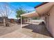Backyard with a covered patio, tile flooring, and partial view of the home at 2559 Winterwood Blvd, Las Vegas, NV 89142