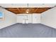 Spacious garage with washer, dryer, and overhead wood rafters at 2559 Winterwood Blvd, Las Vegas, NV 89142