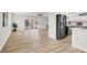 Open layout with modern stainless appliances and sleek breakfast bar perfect for entertaining at 2559 Winterwood Blvd, Las Vegas, NV 89142