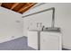 Laundry area with washer, dryer, and door to the exterior at 2559 Winterwood Blvd, Las Vegas, NV 89142