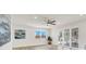 Bright living room with recessed lighting, ceiling fan, stylish floors, and sliding door at 2559 Winterwood Blvd, Las Vegas, NV 89142