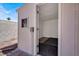 Exterior of shed shows access to additional private storage space for yard tools and equipment at 2559 Winterwood Blvd, Las Vegas, NV 89142
