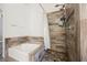 Bathroom featuring a soaking tub and tiled walk-in shower with modern fixtures at 2860 Galena Peak Ln, Las Vegas, NV 89156