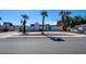 Modern home features desert landscaping, white brick exterior and palm tree accents at 3368 Seneca Dr, Las Vegas, NV 89169