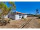 Contemporary single-story home with a desert landscape at 3368 Seneca Dr, Las Vegas, NV 89169