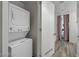 Efficient laundry area featuring a stackable washer and dryer at 353 E Bonneville Ave # 555, Las Vegas, NV 89101