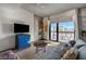 Relaxing living room with a view to the outside balcony and decorative rug and furniture at 353 E Bonneville Ave # 555, Las Vegas, NV 89101