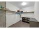 Walk-in closet with built-in shelving and storage space at 353 E Bonneville Ave # 555, Las Vegas, NV 89101