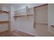 Walk-in closet with built-in shelving and hanging rods at 386 Wiseton Ave, Las Vegas, NV 89183