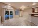 Bright living room with sliding glass doors and tiled floors at 386 Wiseton Ave, Las Vegas, NV 89183